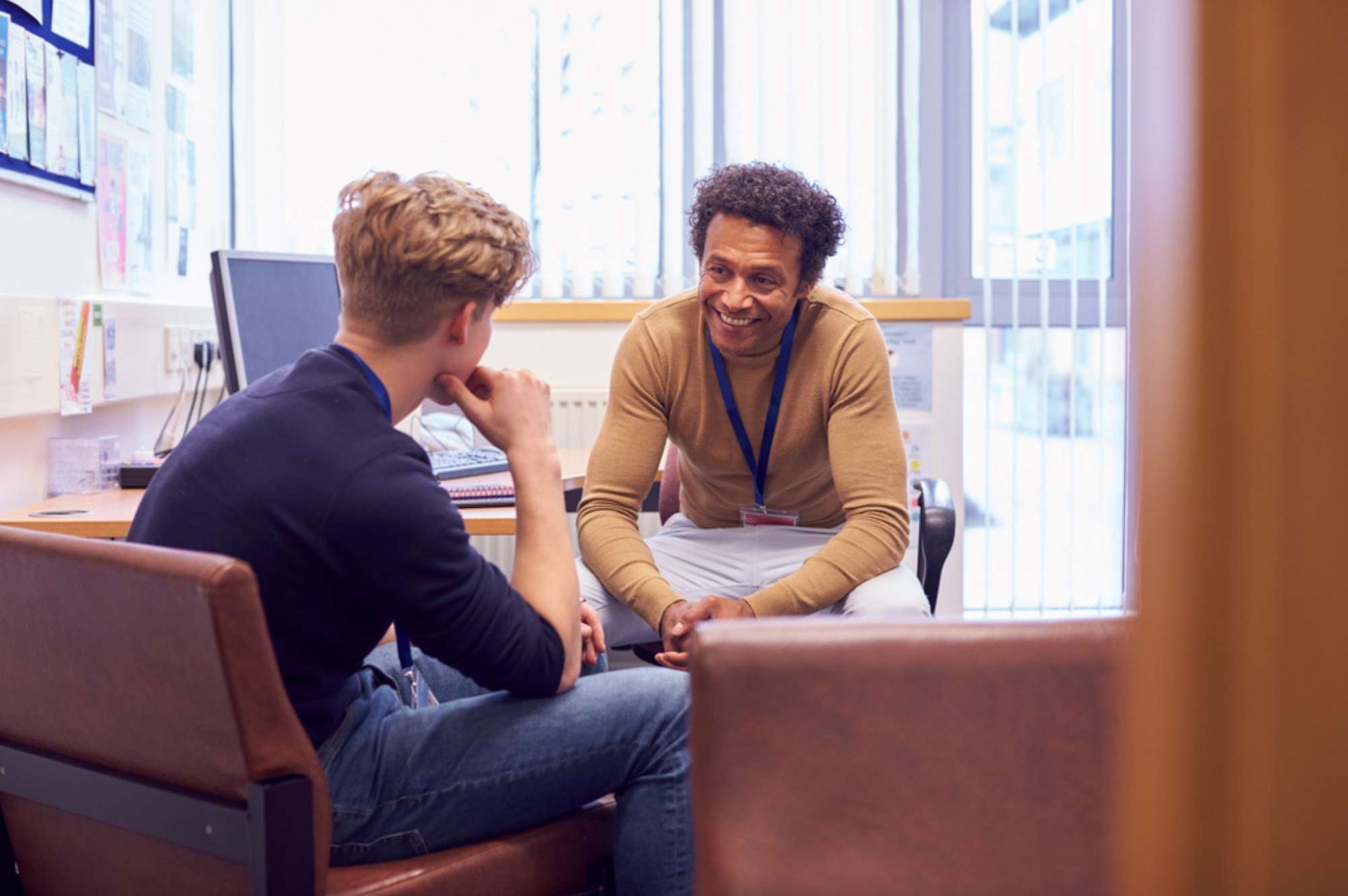 student sitting with counsellor